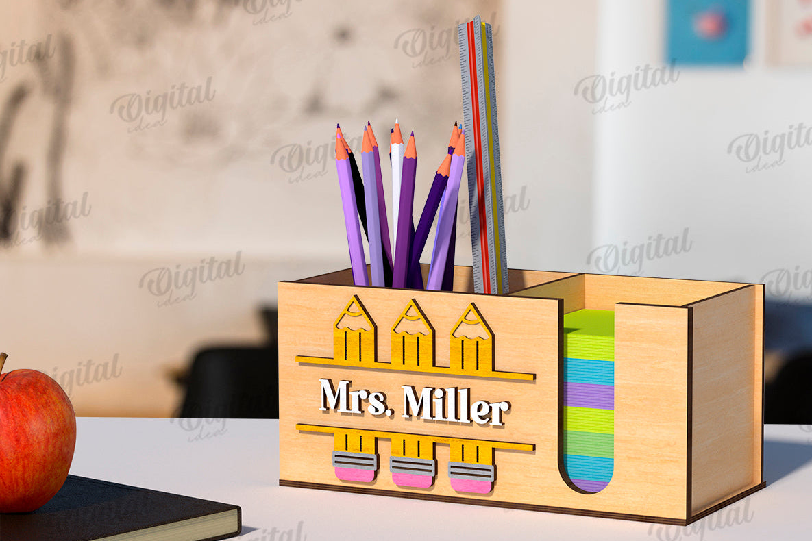 Wooden pencil holder with Teacher's name and pencil cut out.